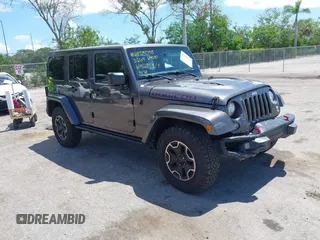 2017 Jeep Wrangler Unlimited Rubicon Recon z VIN 1C4HJWFG2HL560846, wystawiony jako IAAI lot #42532745 z przebiegiem 101 285 mil mil oraz . Historia ofert i sprzedaży dostępna na DreamBid. Obrazek 1.