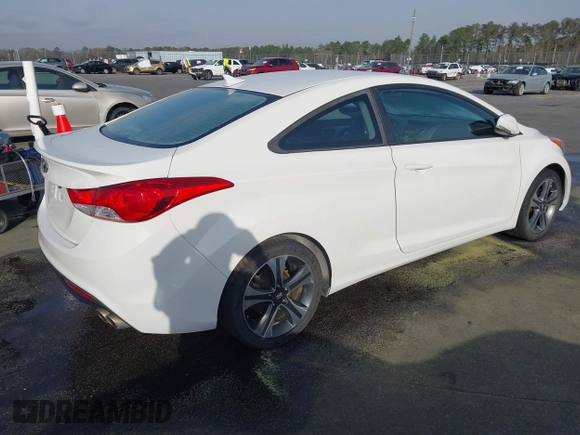 2013 Hyundai Elantra Coupe SE with VIN KMHDH6AE3DU010717, listed as a IAAI auction lot 41832406 with 232,929 mi miles. Bid and sale history available at carsss.com. Image 4.