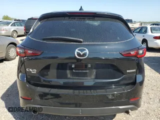 2024 Mazda CX-5 S Carbon Edition z VIN JM3KFBCL0R0419964, wystawiony jako Copart lot #56233285 z przebiegiem 8530 mil mil oraz Szkody całkowita. Historia ofert i sprzedaży dostępna na DreamBid. Obrazek 6.