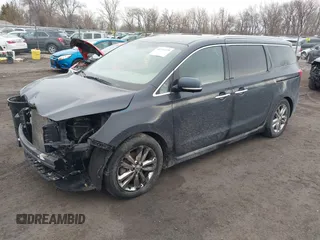 2016 Kia Sedona SX-L with VIN KNDME5C13G6112674, listed as a IAAI auction lot 41711275 with 154,337 mi miles and . Bid and sale history available at carsss.com. Image 2.