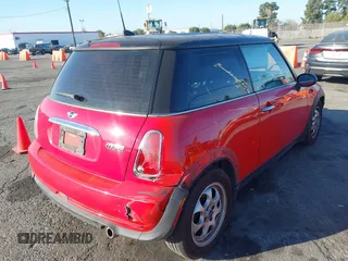 2005 MINI Hardtop with VIN WMWRC33455TJ66323, listed as a IAAI auction lot 41868311 with 122,398 mi miles and . Bid and sale history available at DreamBid. Image 4.