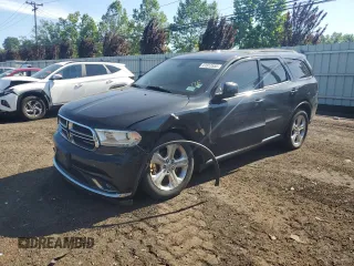 2014 Dodge Durango Limited with VIN 1C4RDJDG0EC973474, listed as a Copart auction lot 61913555 with 171,083 mi miles and Salvage title. Bid and sale history available at DreamBid. Image 1.
