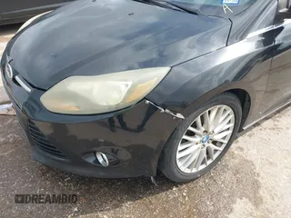 2013 Ford Focus Titanium with VIN 1FADP3J23DL152122, listed as a IAAI auction lot 41935180 with 175,065 mi miles and . Bid and sale history available at carsss.com. Image 6.