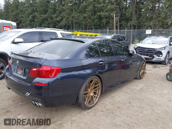 2015 BMW 5 Series 528i with VIN WBA5A5C57FD513039, listed as a IAAI auction lot 42262592 with 79,328 mi miles and . Bid and sale history available at DreamBid. Image 4.