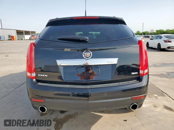 2012 Cadillac SRX Premium Collection with VIN 3GYFNCE39CS580906, listed as a Copart auction lot 52947315 with 38,040 mi miles and Clean title. Bid and sale history available at DreamBid. Image 6.