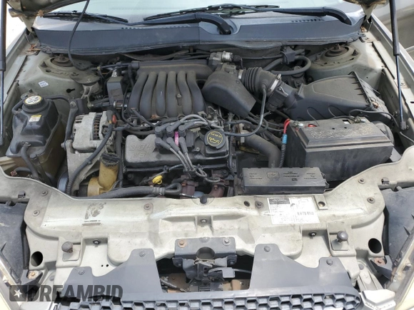 2002 Ford Taurus SES Standard with VIN 1FAFP55U42A184084, listed as a Copart auction lot 59822495 with 124,835 mi miles and Salvage title. Bid and sale history available at DreamBid. Image 11.
