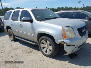 2011 GMC Yukon SLE z VIN 1GKS1AE01BR299392, wystawiony jako IAAI lot #42203056 z przebiegiem 270 946 mil mil oraz . Historia ofert i sprzedaży dostępna na DreamBid. Obrazek 1.