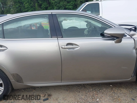2015 Lexus ES 330 with VIN JTHBK1GG4F2207059, listed as a IAAI auction lot 42522324 with 146,506 mi miles and . Bid and sale history available at DreamBid. Image 13.