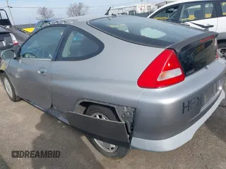 2001 Honda Insight z VIN JHMZE14741T003228, wystawiony jako IAAI lot #41432511 z przebiegiem 227 809 mil mil oraz . Historia ofert i sprzedaży dostępna na DreamBid. Obrazek 3.
