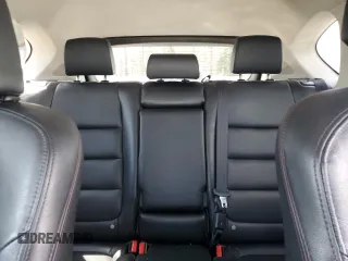 2016 Mazda CX-5 Grand Touring z VIN JM3KE2DY9G0645141, wystawiony jako Copart lot #50989635 z przebiegiem 123 898 mil mil oraz Szkoda całkowita • Salvage title. Historia ofert i sprzedaży dostępna na DreamBid. Obrazek 10.