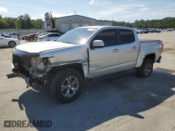 2016 Chevrolet Colorado 4WD Z71 with VIN 1GCGTDE33G1170065, listed as a Copart auction lot 55920665 with 135,410 mi miles and Salvage title. Bid and sale history available at DreamBid. Image 1.
