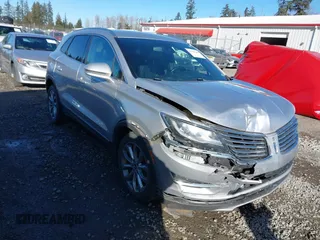 2015 Lincoln MKC with VIN 5LMCJ2A92FUJ32187, listed as a IAAI auction lot 41571438 with 71,819 mi miles. Bid and sale history available at carsss.com. Image 1.
