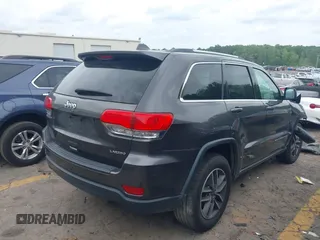 2019 Jeep Grand Cherokee Altitude with VIN 1C4RJEAG7KC556191, listed as a IAAI auction lot 42160524 with 96,373 mi miles and . Bid and sale history available at DreamBid. Image 4.