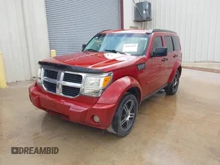 2007 Dodge Nitro SLT with VIN 1D8GT58K77W640112, listed as a IAAI auction lot 42015613 with 220,061 mi miles. Bid and sale history available at carsss.com. Image 2.