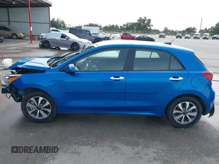 2023 Kia Rio S with VIN 3KPA25AD4PE558982, listed as a IAAI auction lot 41338270 with 40,965 mi miles and . Bid and sale history available at DreamBid. Image 15.