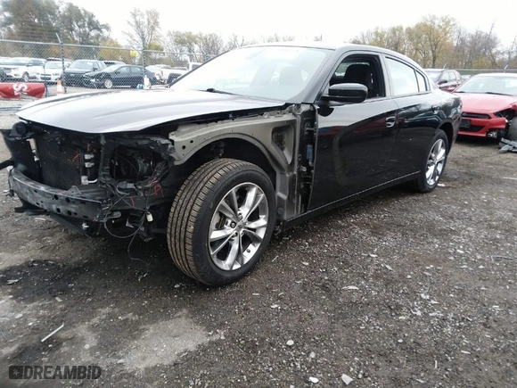 2022 Dodge Charger SXT with VIN 2C3CDXJG3NH206345, listed as a IAAI auction lot 40844458 with 49,387 mi miles. Bid and sale history available at carsss.com. Image 2.