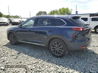 2016 Mazda CX-9 Grand Touring with VIN JM3TCBDY0G0116686, listed as a Copart auction lot 54077335 with 142,670 mi miles and Salvage title. Bid and sale history available at DreamBid. Image 2.