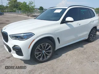2021 BMW X5 xDrive45e with VIN 5UXTA6C08M9F38909, listed as a IAAI auction lot 42172536 with 71,741 mi miles and . Bid and sale history available at DreamBid. Image 19.