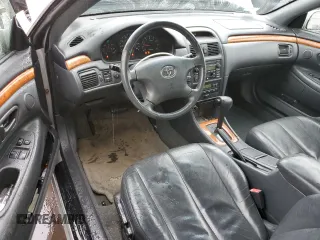 2002 Toyota Solara SE with VIN 2T1CF28P42C593010, listed as a Copart auction lot 50085005 with 214,180 mi miles and Salvage Title. Bid and sale history available at DreamBid. Image 8.