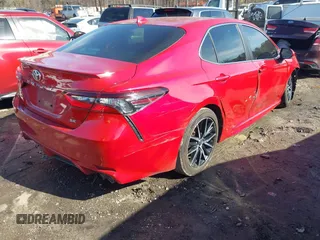 2021 Toyota Camry SE Nightshade with VIN 4T1G11AK1MU435153, listed as a IAAI auction lot 41389032 with 107,381 mi miles. Bid and sale history available at carsss.com. Image 4.