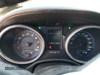 2012 Jeep Grand Cherokee SRT8 with VIN 1C4RJFDJ2CC352056, listed as a Copart auction lot 48810994 with 114,807 mi miles and Salvage Title. Bid and sale history available at carsss.com. Image 9.