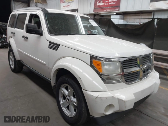2007 Dodge Nitro SLT with VIN 1D8GU58K97W583408, listed as a IAAI auction lot 41653696 with 124,449 mi miles. Bid and sale history available at carsss.com. Image 1.