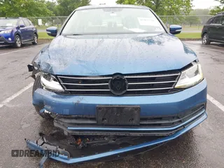 2017 Volkswagen Jetta SE with VIN 3VWDB7AJ0HM293674, listed as a IAAI auction lot 42457531 with 74,109 mi miles and . Bid and sale history available at DreamBid. Image 6.