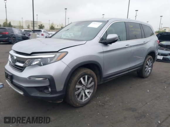 2019 Honda Pilot EX-L with VIN 5FNYF6H54KB055687, listed as a IAAI auction lot 42050539 with 50,989 mi miles and . Bid and sale history available at carsss.com. Image 18.