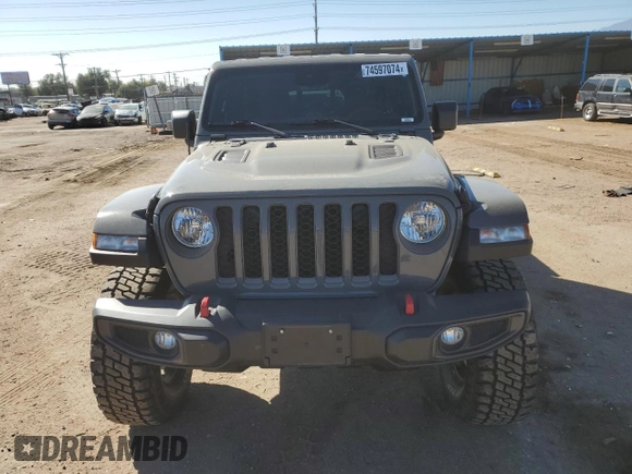 2022 Jeep Gladiator Rubicon z VIN 1C6JJTBG9NL101774, wystawiony jako Copart lot #74597074 z przebiegiem 11 903 mil mil oraz Szkoda całkowita • Salvage title. Historia ofert i sprzedaży dostępna na DreamBid. Obrazek 5.