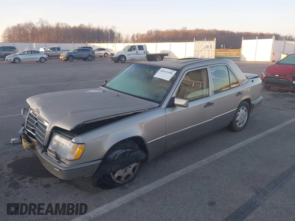 1994 Mercedes-Benz 400 with VIN WDBEA34E4RC015119, listed as a IAAI auction lot 40933590 with 77,554 mi miles. Bid and sale history available at carsss.com. Image 2.
