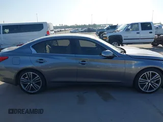 2015 Infiniti Q50 Premium with VIN JN1BV7AP8FM331055, listed as a IAAI auction lot 41828967 with 110,683 mi miles. Bid and sale history available at carsss.com. Image 14.