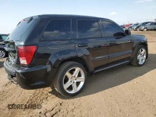2008 Jeep Grand Cherokee SRT-8 with VIN 1J8HR78308C174606, listed as a Copart auction lot 70313584 with 169,765 mi miles and Salvage Title. Bid and sale history available at carsss.com. Image 3.