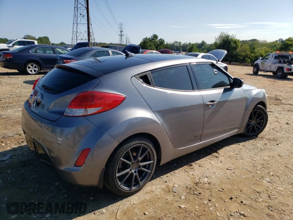 2016 Hyundai Veloster with VIN KMHTC6AD7GU248608, listed as a Copart auction lot 65809693 with 104,784 mi miles. Bid and sale history available at carsss.com. Image 3.