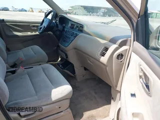 2000 Honda Odyssey EX with VIN 2HKRL1868YH513587, listed as a IAAI auction lot 42092115 with 302,555 mi miles and . Bid and sale history available at DreamBid. Image 5.