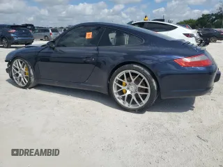 2008 Porsche 911 Carrera S z VIN WP0AB29948S730814, wystawiony jako Copart lot #52307795 z przebiegiem 60 861 mil mil oraz Szkoda całkowita • Salvage title. Historia ofert i sprzedaży dostępna na DreamBid. Obrazek 2.