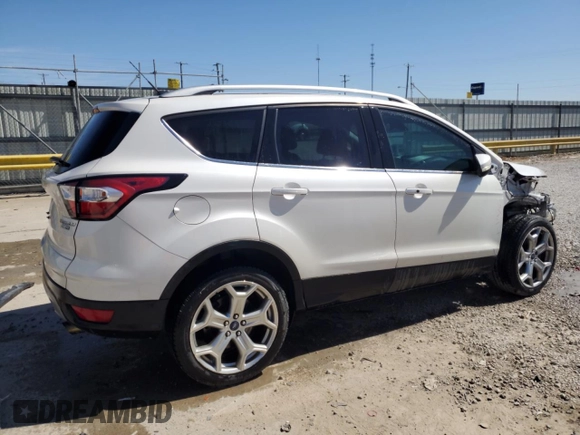 2017 Ford Escape Titanium with VIN 1FMCU9J96HUB65716, listed as a Copart auction lot 49584665 with 112,149 mi miles and Salvage Title. Bid and sale history available at carsss.com. Image 3.