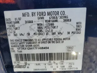 2007 Ford F-150 STX with VIN 1FTRX12W17FA68454, listed as a Copart auction lot 50409485 with 256,600 mi miles and Salvage Title. Bid and sale history available at DreamBid. Image 14.