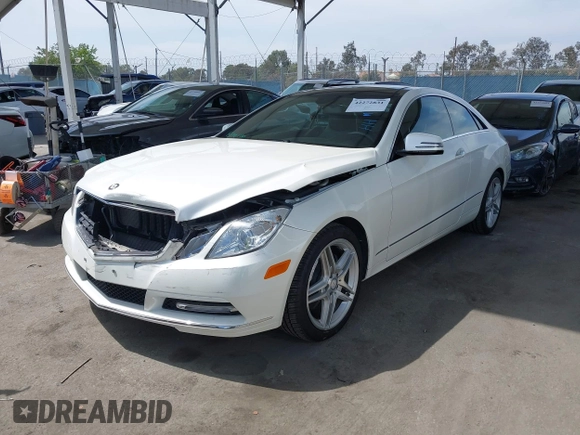 2013 Mercedes-Benz E 350 with VIN WDDKJ5KB1DF197335, listed as a IAAI auction lot 42272831 with 58,092 mi miles and . Bid and sale history available at DreamBid. Image 2.