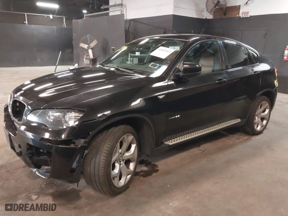 2014 BMW X6 xDrive35i with VIN 5UXFG2C51E0K41841, listed as a IAAI auction lot 41851513 with 79,272 mi miles. Bid and sale history available at carsss.com. Image 2.