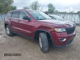 2018 Jeep Grand Cherokee Laredo E with VIN 1C4RJEAGXJC404419, listed as a IAAI auction lot 42167397 with 166,316 mi miles and . Bid and sale history available at DreamBid. Image 1.