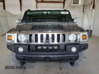 2005 Hummer H2 SUV z VIN 5GRGN23U65H127711, wystawiony jako Copart lot #53180865 z przebiegiem 178 085 mil mil oraz Szkody całkowita. Historia ofert i sprzedaży dostępna na DreamBid. Obrazek 5.