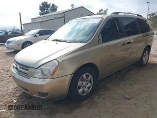 2009 Kia Sedona LX with VIN KNDMB233996303544, listed as a IAAI auction lot 41352987 with 230,510 mi miles. Bid and sale history available at carsss.com. Image 2.