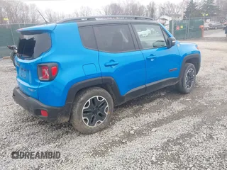 2015 Jeep Renegade Trailhawk with VIN ZACCJBCT4FPB41376, listed as a IAAI auction lot 41943388 with 65,963 mi miles and . Bid and sale history available at DreamBid. Image 4.