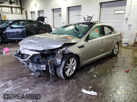 2013 Kia Optima EX с VIN 5XXGN4A70DG239393, выставлен на аукционе Copart как лот 41923615 с пробегом Не указан миль и Списание • Salvage title. История ставок и продаж доступна на DreamBid. Изображение 1.