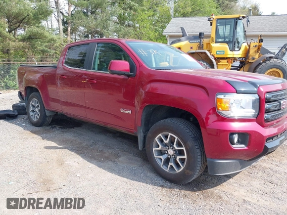2019 GMC Canyon 4WD All Terrain z VIN 1GTG6FEN1K1290802, wystawiony jako IAAI lot #42150541 z przebiegiem 41 296 mil mil oraz . Historia ofert i sprzedaży dostępna na DreamBid. Obrazek 1.
