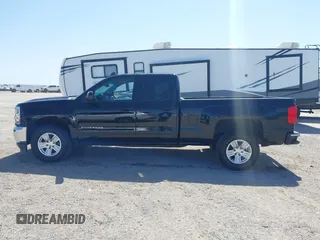 2018 Chevrolet Silverado 1500 LT with VIN 1GCRCREC5JZ127362, listed as a IAAI auction lot 41859085 with 158,364 mi miles and . Bid and sale history available at DreamBid. Image 14.