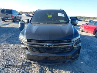 2021 Chevrolet Suburban RST z VIN 1GNSCEKD2MR340613, wystawiony jako IAAI lot #41853016 z przebiegiem 77 498 mil mil oraz . Historia ofert i sprzedaży dostępna na DreamBid. Obrazek 12.