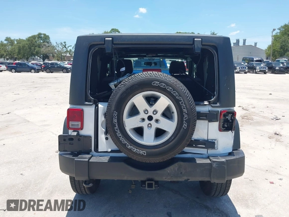 2013 Jeep Wrangler Sport with VIN 1C4AJWAG0DL542624, listed as a IAAI auction lot 42590160 with 54,850 mi miles and . Bid and sale history available at DreamBid. Image 16.