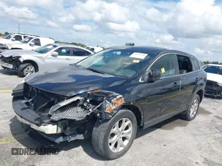 2012 Mazda CX-9 Touring with VIN JM3TB3CV1C0338681, listed as a IAAI auction lot 40458498 with 128,665 mi miles and . Bid and sale history available at DreamBid. Image 6.