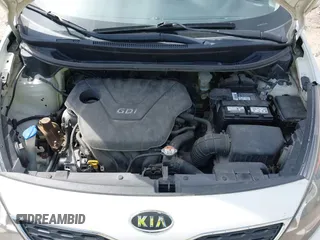 2012 Kia Rio EX with VIN KNADN5A37C6031494, listed as a IAAI auction lot 42052186 with 141,765 mi miles. Bid and sale history available at carsss.com. Image 10.